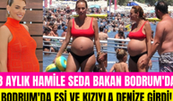 8 aylık hamile oyuncu Seda Bakan bikinisiyle görüntülendi! Eşi ve kızıyla halk plajında eğlendi