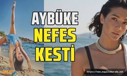 Oyuncu Aybüke Pusat mavi bikinisiyle jimnastikçilere özendi