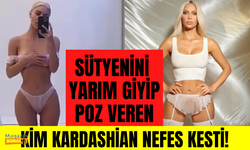 Sütyenini tam giymeyip ayna karşısında poz veren Kim Kardashian nefes kesti