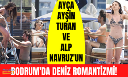 Alp Navruz ile Ayça Ayşin Turan'ın Bodrum romantizmi! Önce güneşlendiler sonra denize girdiler!