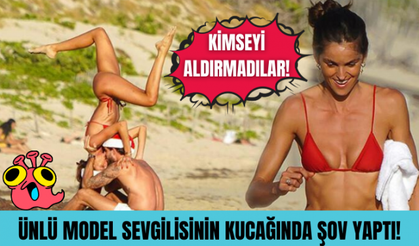 Dünyaca ünlü model sevgilisinin kucağında şov yaptı!