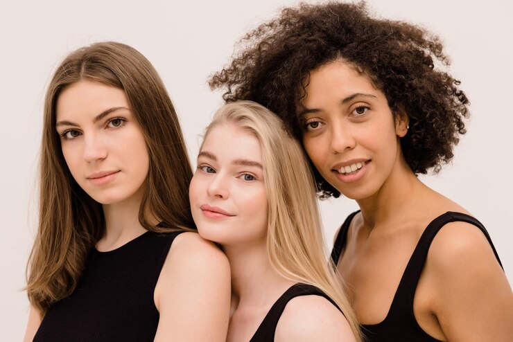 Closeup Young Women Different Nationalities Black Tops Looking Camera White Background 197531 31845